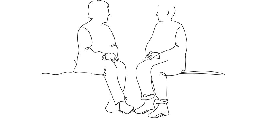 Personen sitzen auf Bank